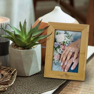 Our wooden photo frame is a 6 x 4 inch photo frame.  Made from natural bamboo.  Perfect for personalisation and engraving.