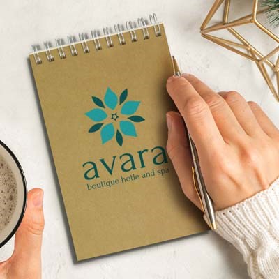 The Kraft Note Pad is a 60 page, A7 line noted pad made from 100% recycled paper.  Natural with silver wiro binding.