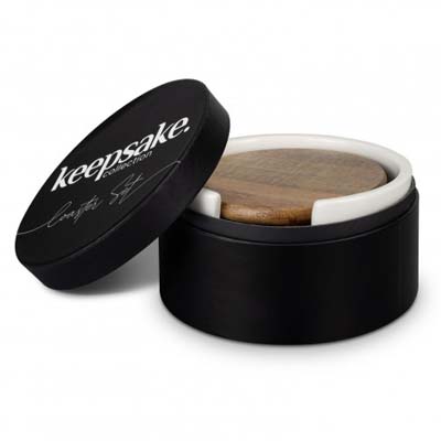 The Keepsake Coaster set is a premium coaster set - 6 circular acacia wood coasters. Black ceramic Storage holder. Ready for you to personalise for your clients.