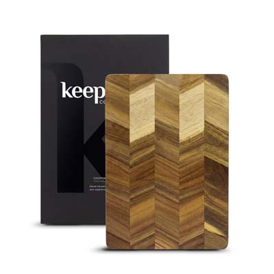 The Keepsake Chopping board is an acacia chopping board with a chevron pattern making each one unique.  Ideal for engraving.  Keepsake branded gift box.