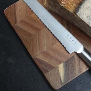The Keepsake Chopping board is an acacia chopping board with a chevron pattern making each one unique.  Ideal for engraving.  Keepsake branded gift box.
