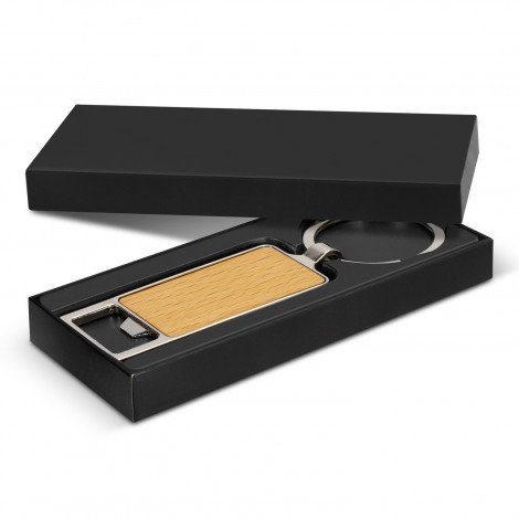 The Santo Bottle Opener Key Ring is a functional bottle opener key chain. Metal body with wooden front. Suitable for engraving or print.