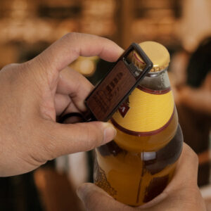 The Santo Bottle Opener Key Ring is a functional bottle opener key chain. Metal body with wooden front. Suitable for engraving or print.